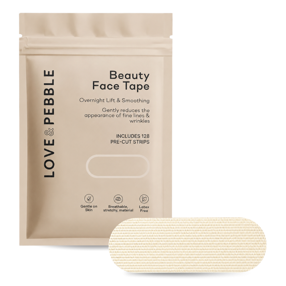 A beige stand-up pouch labeled LOVE PEBBLE Beauty Face Tape, shown with one pre-cut rectangular face tape strip in front on a white background.